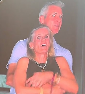 Screenshot of Andy Byron and Kristin Cabot on the big screen at the Coldplay concert